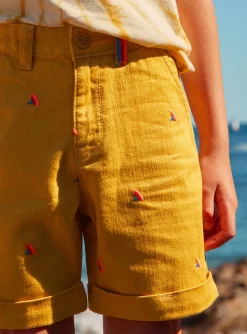 Bermuda Shorts-Sergent Major Mustard shorts with multicoloured shark fin embroideries